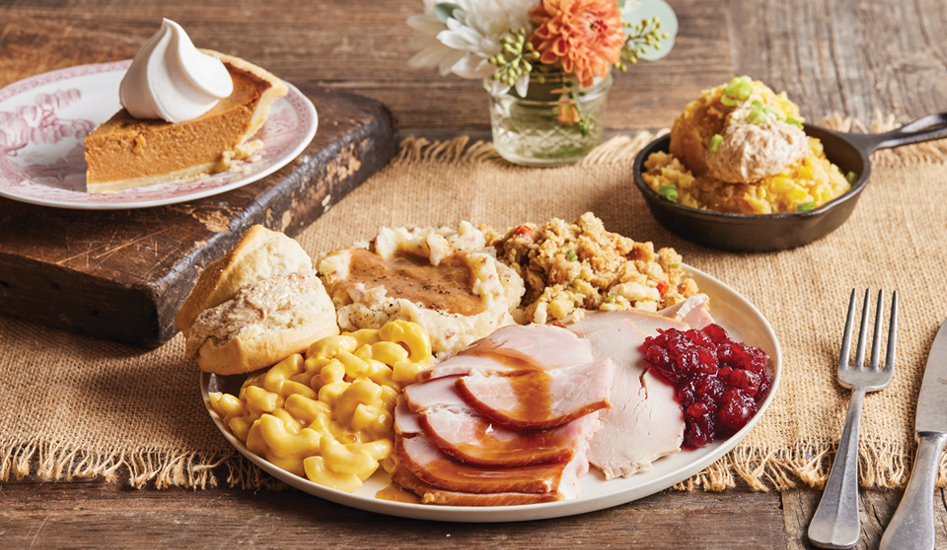 Individual Thanksgiving Dinner served with your choice of Slow-Smoked Turkey, Ham or both, Garlic Mashed Potatoes, Macaroni & Cheese, Southern Stuffing, County Fair Corn Pudding, Giblet Gravy, Cranberry Sauce, Biscuits with Apple Butter and a slice of Pumpkin Pie.