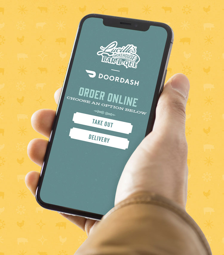 hand holding iPhone with Lucille's logo and DoorDash logo with online order options that now include Take-Out and Delivery 